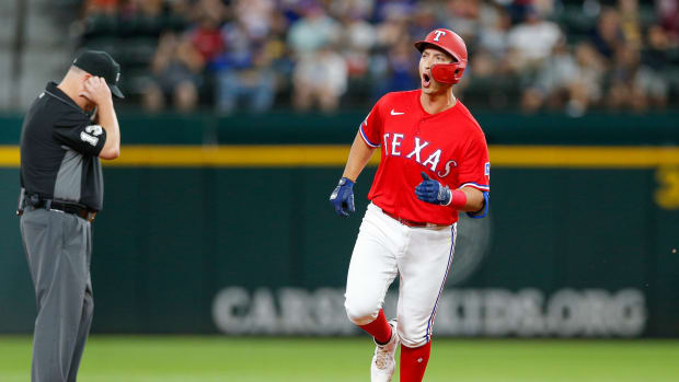 Aug 26, 2022; Arlington, Texas, USA; Aug 26, 2022; Arlington, Texas, USA; (Editors Notes: Caption Correction) Texas Rangers designated hitter Mark Mathias (9) celebrates while rounding the bases after hitting a two-run home run during the third inning against the Detroit Tigers at Globe Life Field. Mandatory Credit: Andrew Dieb-USA TODAY Sports